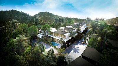 Aerial view of a modern residential complex surrounded by lush greenery