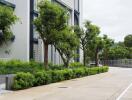 Modern building exterior with landscaped greenery