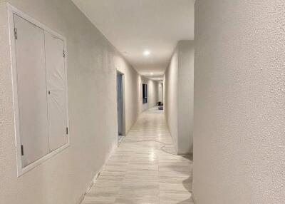 Bright hallway with tiled floor