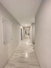 Bright hallway with tiled floor