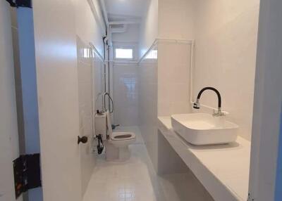 Bathroom with modern sink and toilet