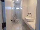 Bathroom with modern sink and toilet