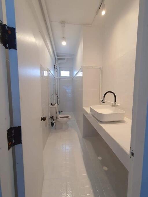 Bathroom with modern sink and toilet