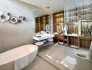 Modern bathroom with a bathtub, sink, and glass-enclosed shower