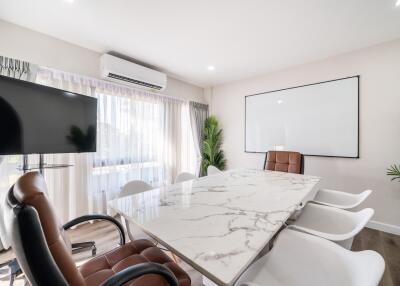 Modern meeting room with a large marble table