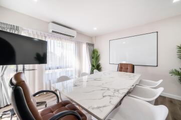 Modern meeting room with a large marble table