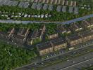 Aerial view of residential buildings surrounded by greenery