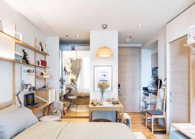 Modern and bright studio apartment with bedroom and kitchen area