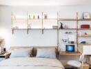 Cozy bedroom with a study nook and decorative shelving