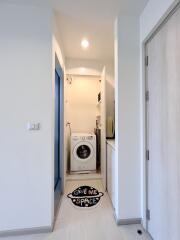 Compact laundry space with washing machine