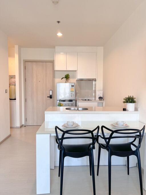 Modern kitchen space with dining area