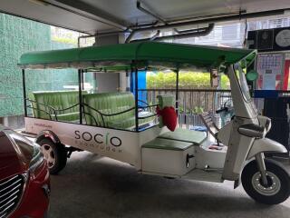 Three-wheeled vehicle parked in a garage