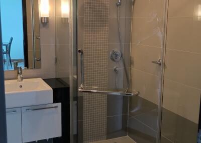 Modern bathroom with glass shower enclosure