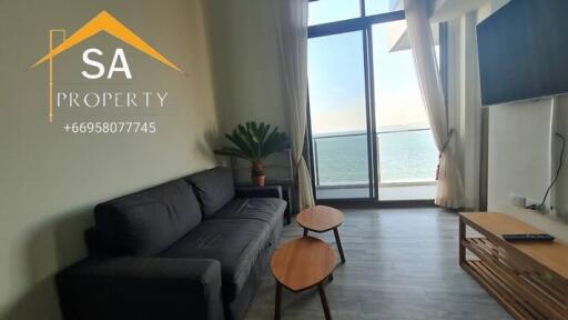 Living room with a view of the ocean