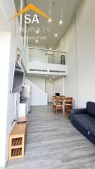 Modern living room with dining area and mezzanine