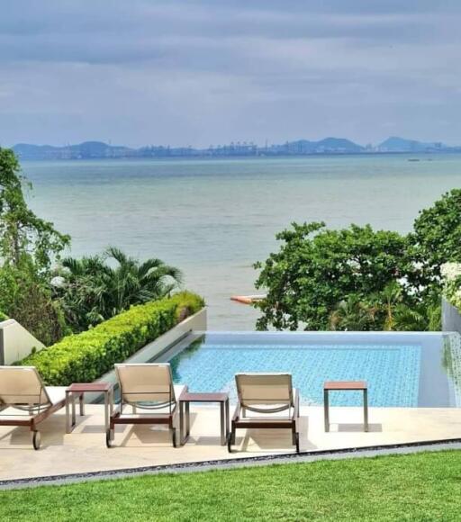 Outdoor area with a pool overlooking the ocean