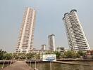 Exterior view of high-rise apartment buildings near waterfront