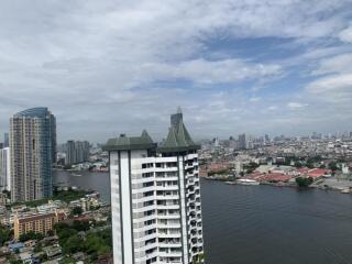 View of cityscape and river from a high-rise building