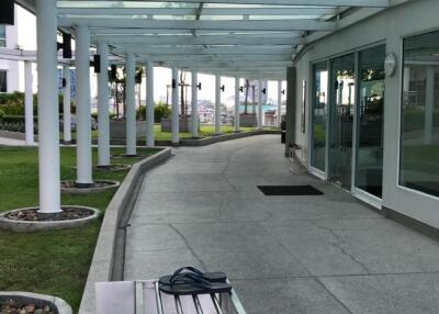 Covered outdoor walkway with glass roof