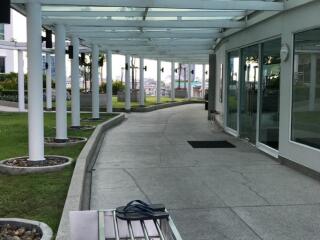 Covered outdoor walkway with glass roof