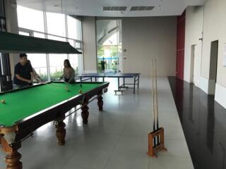 Recreational room with a pool table and table tennis