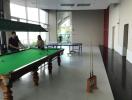 Recreational room with a pool table and table tennis