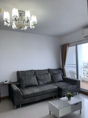 Modern living room with sofa and chandelier