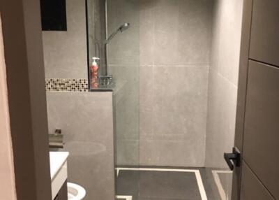 Modern bathroom with glass shower enclosure