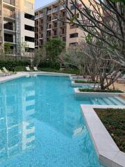 Outdoor swimming pool in a residential complex