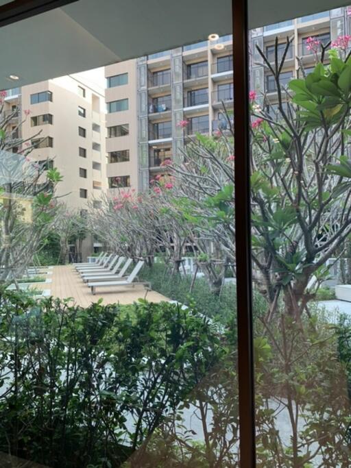 View of residential buildings and outdoor seating area