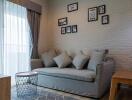 Cozy living room with a grey sofa and decor