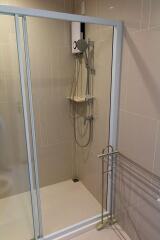 Modern bathroom with glass shower enclosure