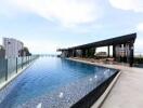 Rooftop communal swimming pool with scenic views