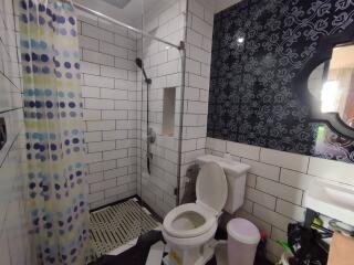 Modern bathroom with subway tiles and shower area