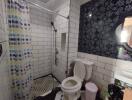 Modern bathroom with subway tiles and shower area