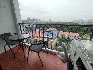 Balcony with seating and city view