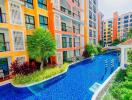 Colorful apartment building with swimming pool