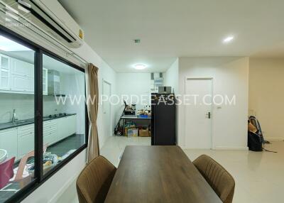 Modern dining area with kitchen view