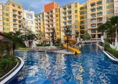 Modern condominium complex with a swimming pool