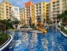 Modern condominium complex with a swimming pool