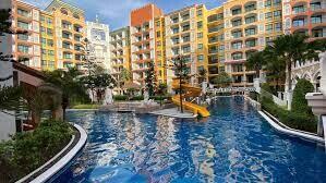 Modern condominium complex with a swimming pool