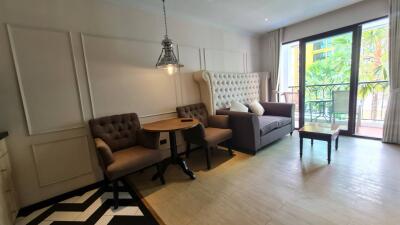 Modern living room with seating area and balcony