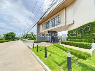 Exterior view of the building with landscaped garden