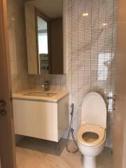 Modern bathroom with sink and toilet