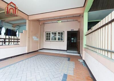 Covered outdoor area leading into the main house