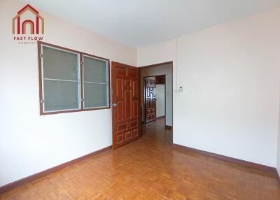 empty bedroom with wooden floor