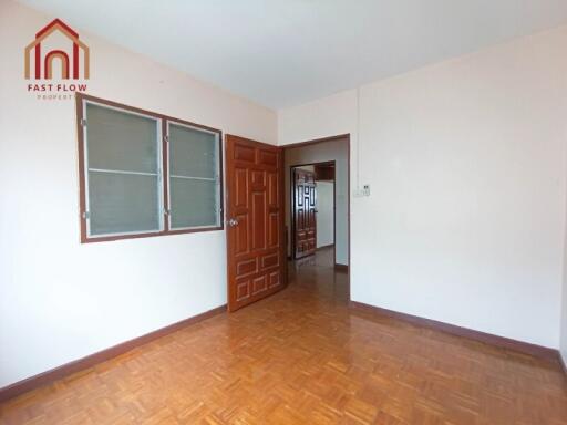 empty bedroom with wooden floor