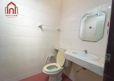 Bathroom with a sink and toilet