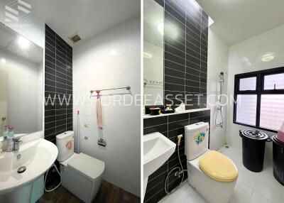 Modern bathroom with black and white tiles