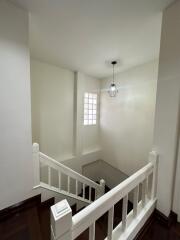 Well-lit staircase with modern lighting